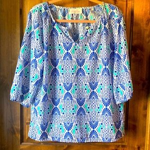 Boutique, poly top. Navy and teal pattern.